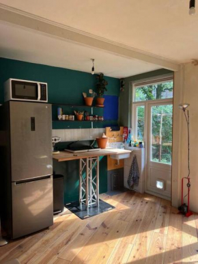 Benedenwoning met tuin in Bos en Lommer!